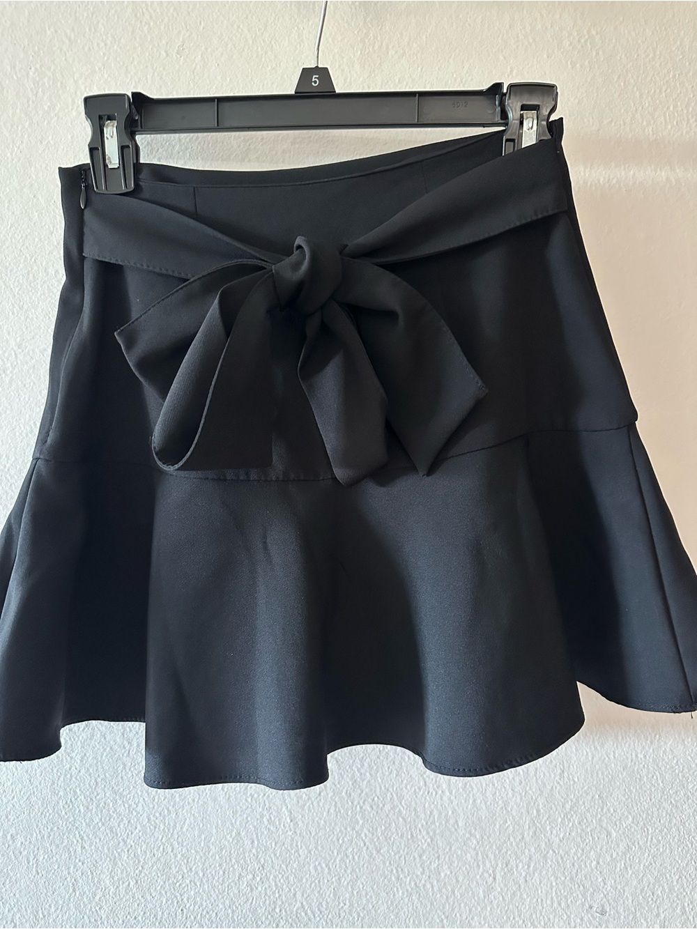 Black Zara skort, size extra small; it has a left-side closure and ties.
